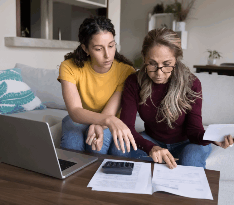 two women looking over their finances